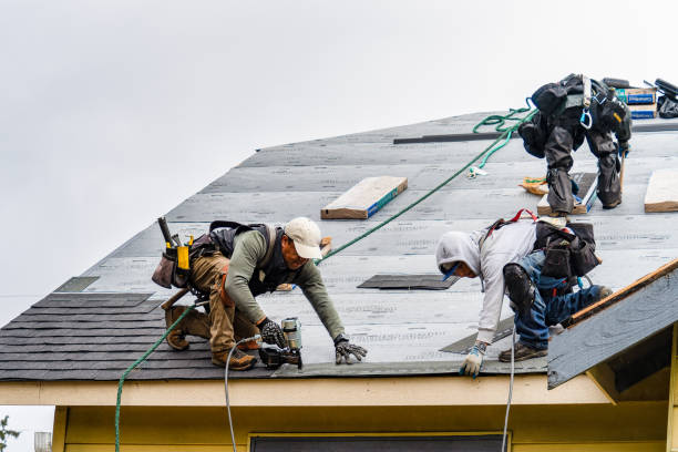 Professional Roof Replacement technician working in Attleboro, MA